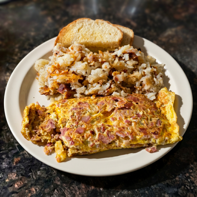 Ham or Bacon or Sausage & Cheese Omelet.